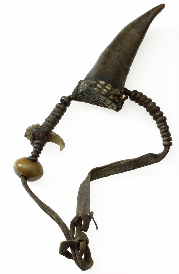 Amuletic necklace, horn filled with "medicine", claw