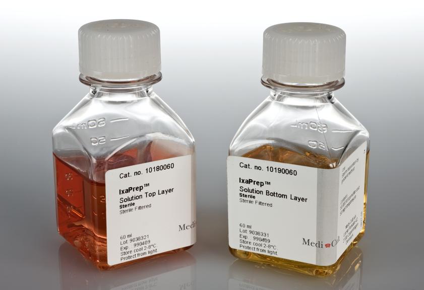 Two screw-top bottles for drugs to stimulate ovulation (FSH and MCG)