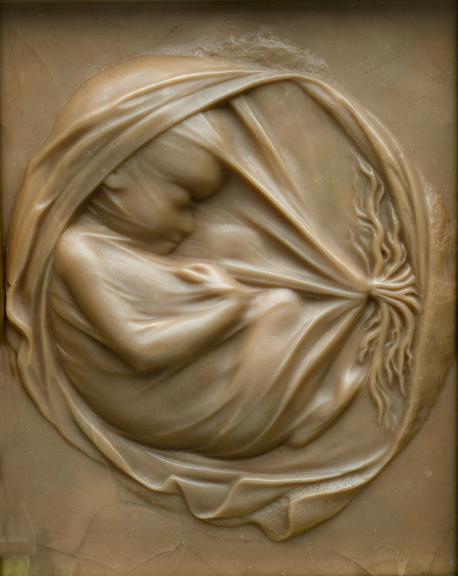 Wax plaque showing foetus in the womb