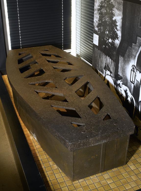 Iron mortsafe 1801-1822. Full view, 3/4 gallery shot.