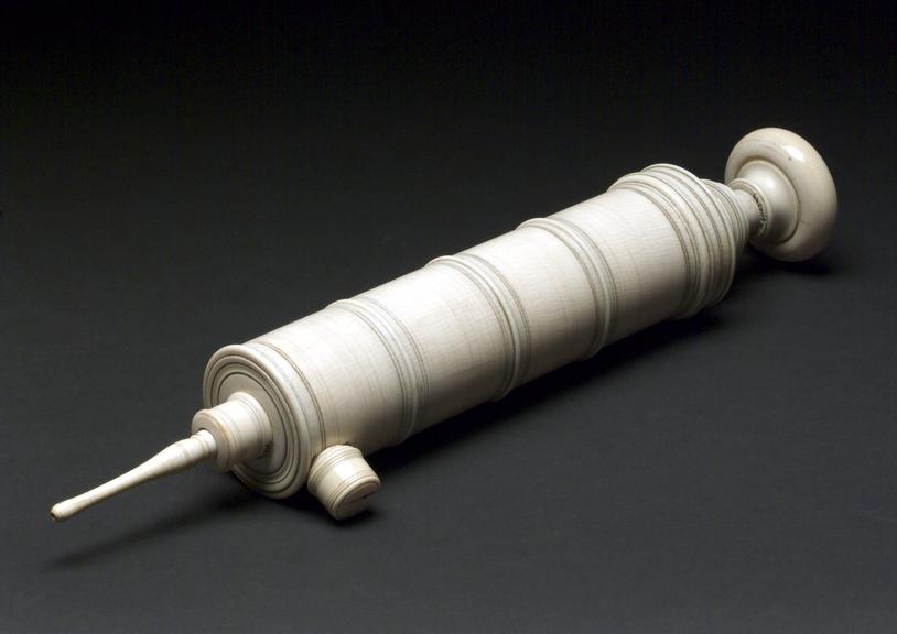 Large ivory enema syringe, piston action, French, 18th century