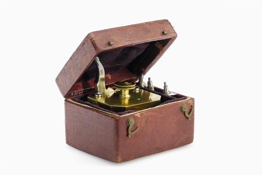 Brass scarificator, with 12 lancets, in case, 19th century