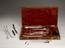 Lithotomy set, complete, in mahogany case, by Savigny and Co