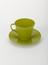 Plastic cup and saucer, green, by `Seno',  Maartensdijk