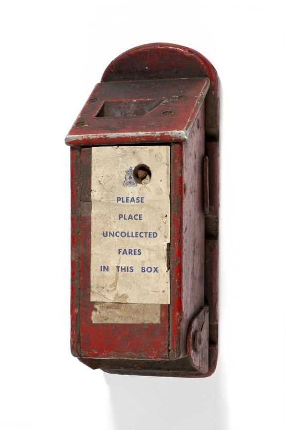 Railway fare collection box photographed three quarter view on