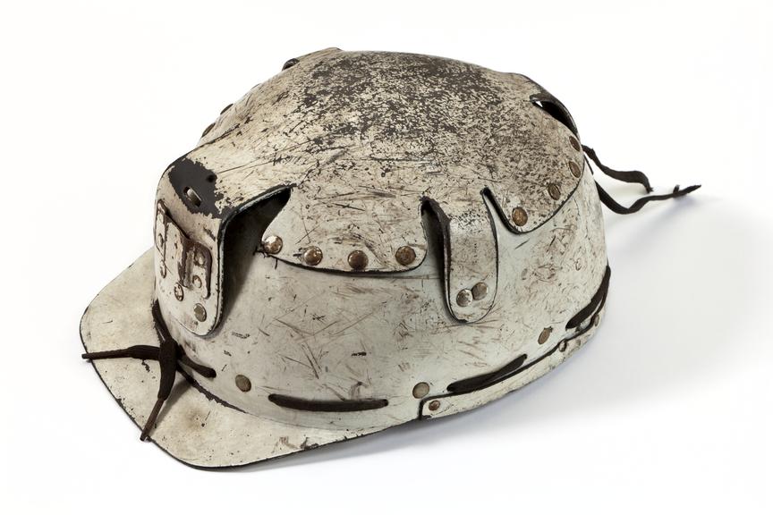 Coal miner's compressed paper helmet ('hard hat') about 1950.