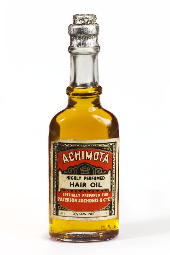 Achimota Highly Perfumed Hair Oil in a labeled glass bottle