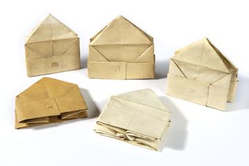 5 hats made from folded paper