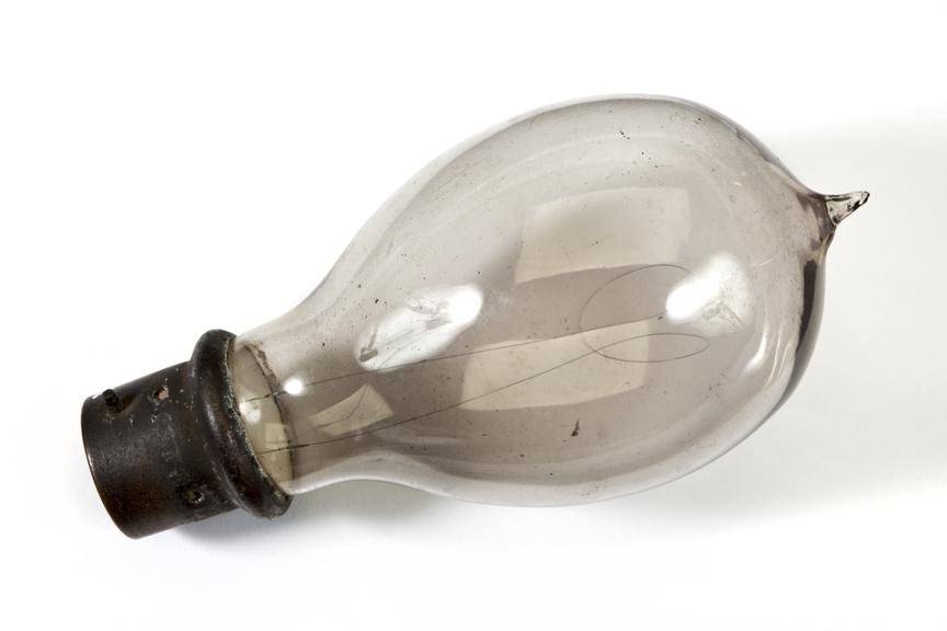 Lightbulb with bayonnet fitting photographed from above on a