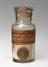 Four dyes in glass bottles with cork stoppers, 1800-1900