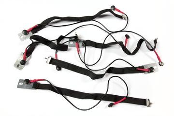 Electrically conductive straps worn with National Grid high-voltage linesman's 'live line working' boiler suit