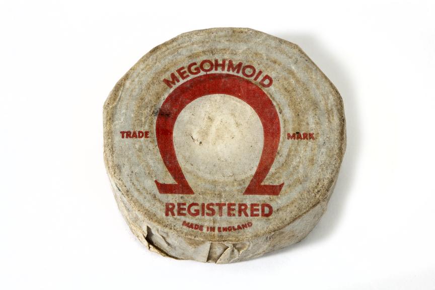 Reel of Megohmoid insulation tape photographed from above on a