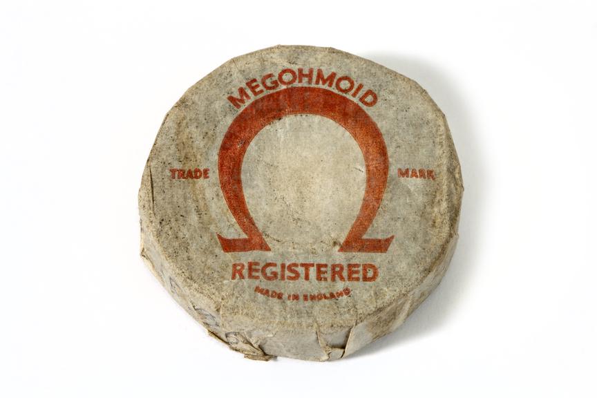 Reel of Megohmoid insulation tape photographed from above on a