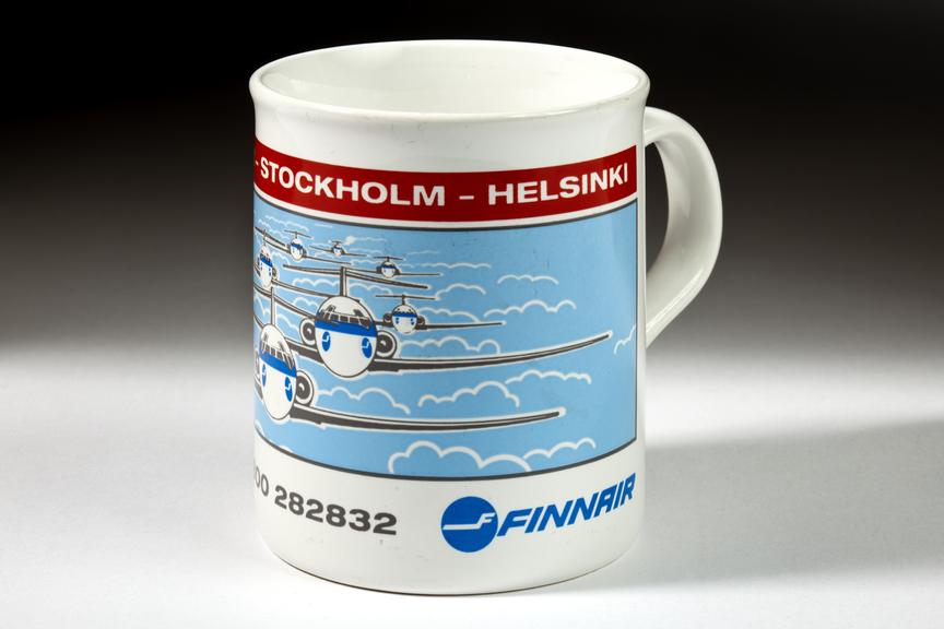 Mug commemorating the launch of the Finnair Manchester to