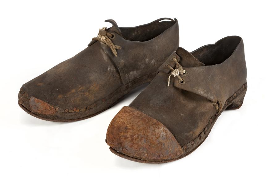 Pair of steel toe-capped cloggs. Used at Sandhole Colliery.