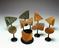 Set of 7 assembled cardboard geometrical models on wooden