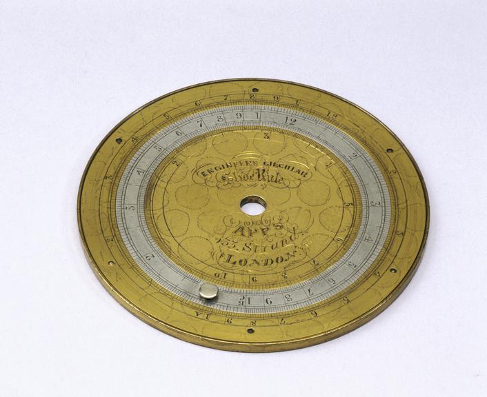 Circular slide rule, c 1870.