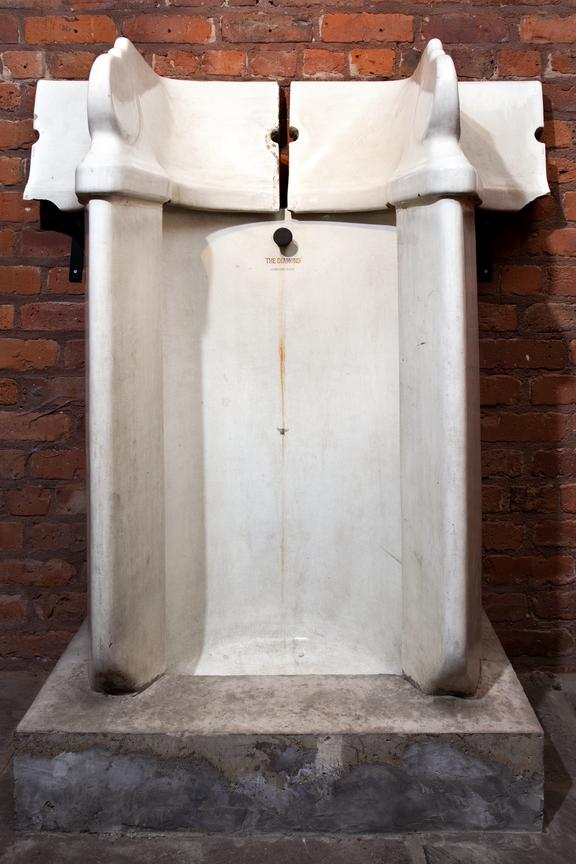 Central section of urinal; bears the inscription 'The Diamond