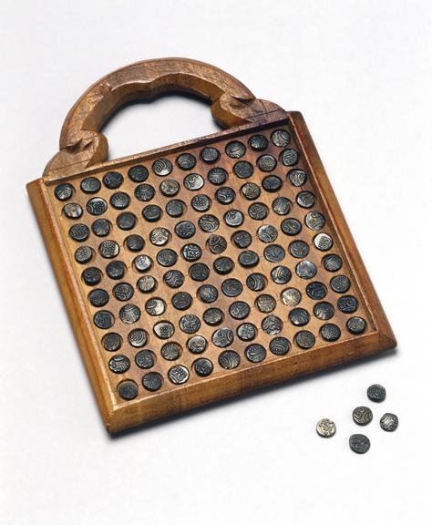 Chukkrum board with 112 small native coins