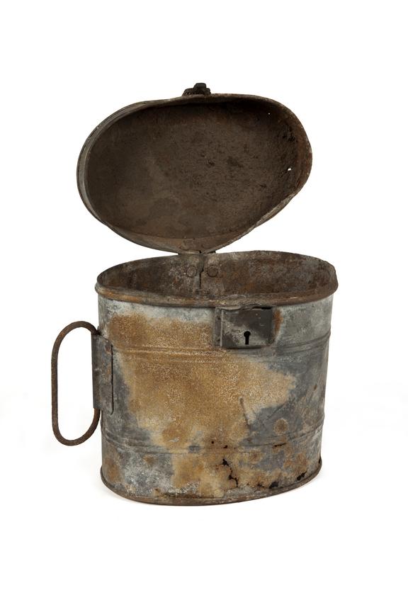 Powder Bag- Metal container with carrying handle on a side