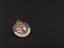 Circular badge with 'RED CROSS & ST JOHN' on blue around the