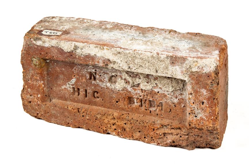 Brick engraved 'NCB HIC...'