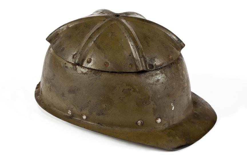 Fibrous miner's hard hat.