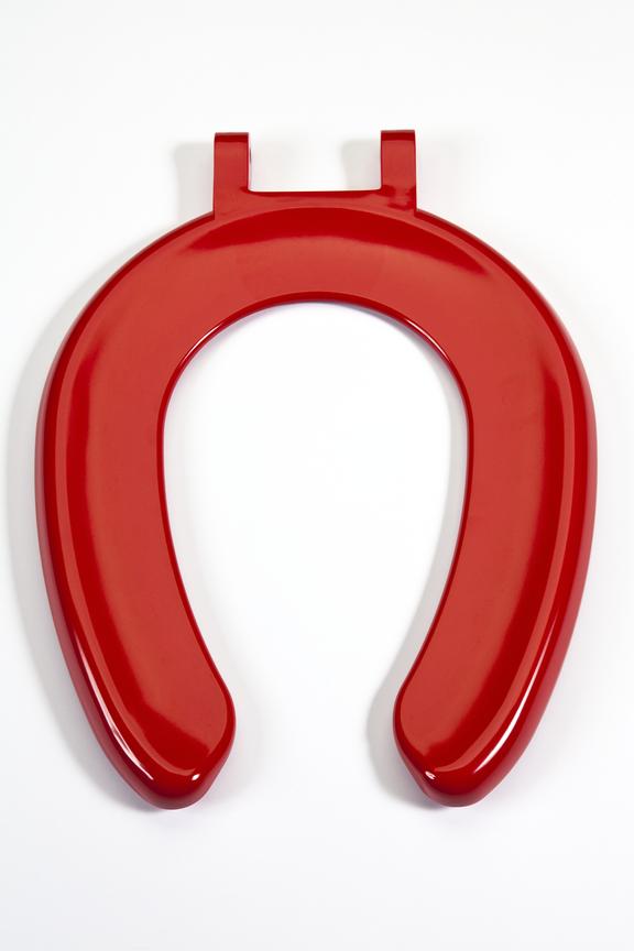 red toilet seat made by CME Sanitary Systems Ltd; 'Germshield'