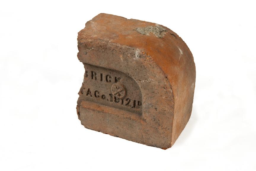 Half brick with raidius edge, coal mining.