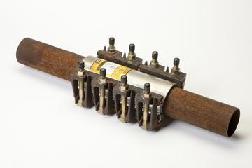 Gas pipe repair saddle designed to patch cracks or leaks in ductile iron gas pipes