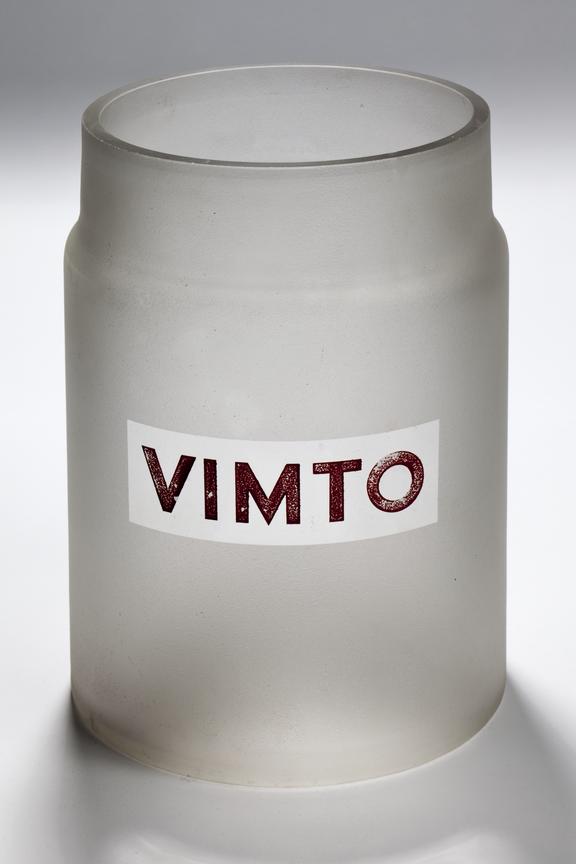 glass jar inscribed VIMTO in red lettering.