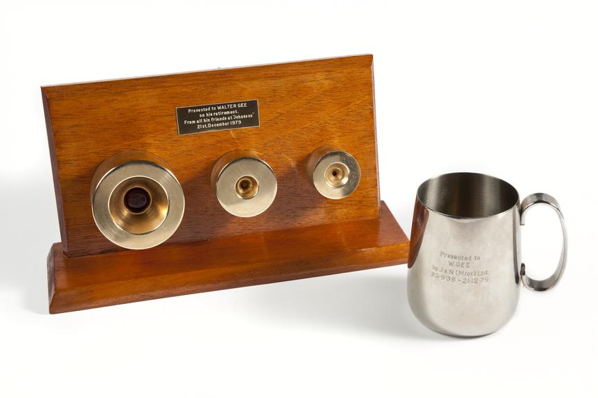 Three gold-plated cable dies and presentation tankard