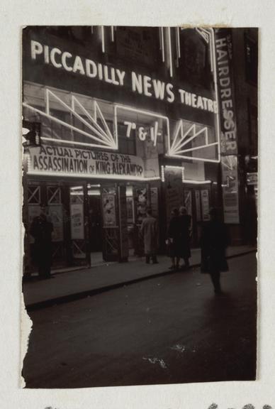 Photograph of the Piccadilly News Theatre at  night