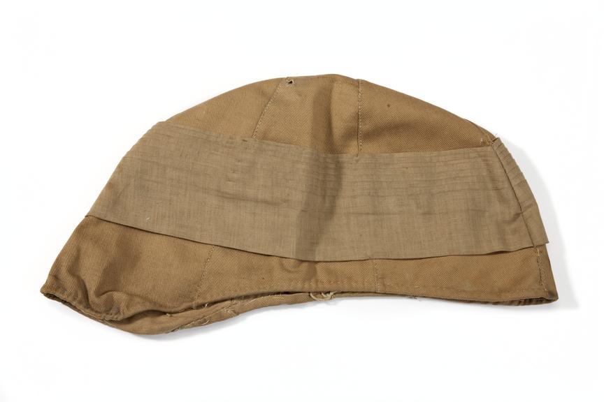 Khaki drill cover for Foreign Service Helmet.