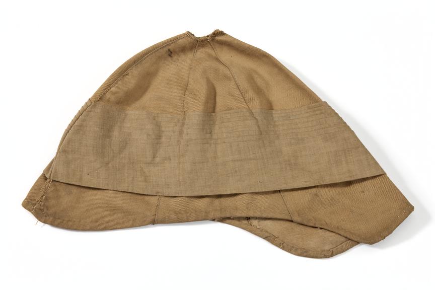 Khaki drill cover for Foreign Service Helmet.