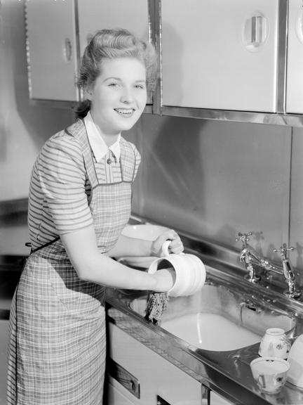 Woman doing the washing up