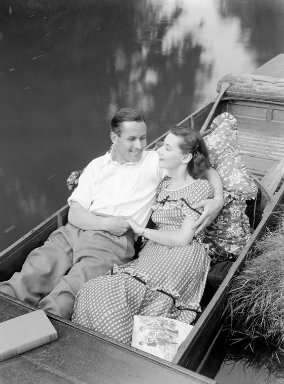 Couple embracing in a boat
    A photograph of a couple embracing