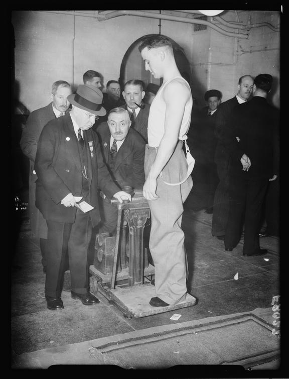 At the weigh-in
    A photograph of a competitor weighing-in