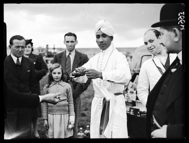 'A tipster performing tricks at Epsom'
    A photograph of Abdul