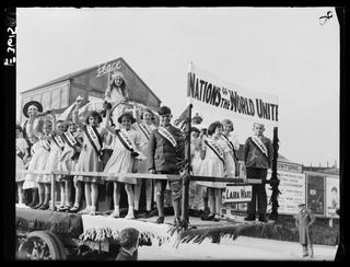 Young people on a float in a May Day Parade