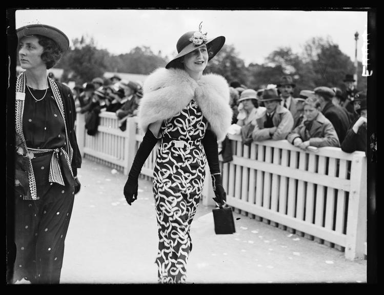 Woman at Royal Ascot
    A photograph of a woman walking past the