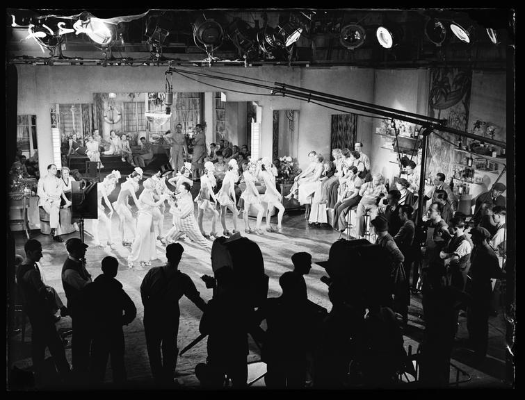 Filming 'I'll Stick to You'
    A photograph of a film studio scene