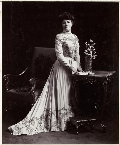 Woman standing at a table