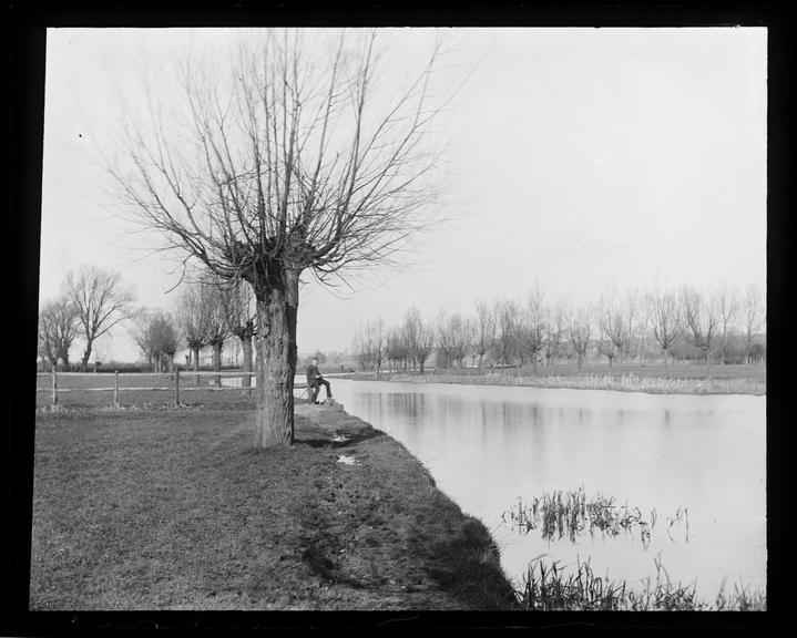 'Study Of Man Fishing By River'