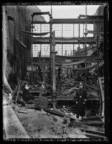 After the Fire at Laurie and McConnals, Fitzroy Street, Cambridge, with PC Smith, Ethel Mountford and Pauline in Foreground