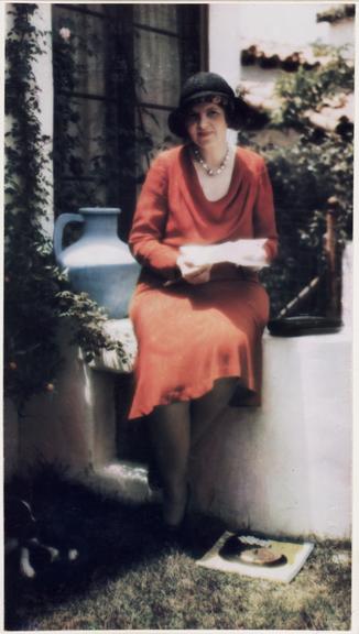 Woman sitting in a garden