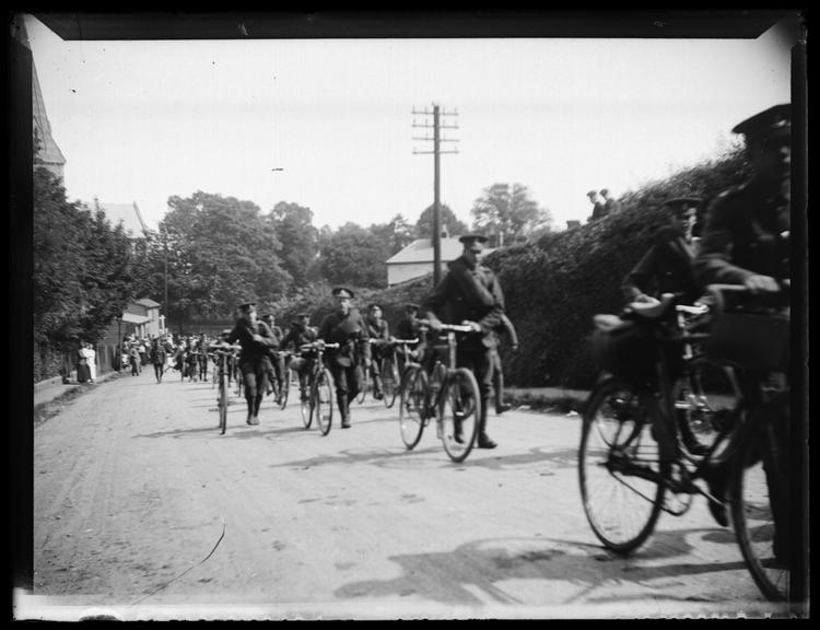 'Parade Of Soldiers Marching With Bikes'