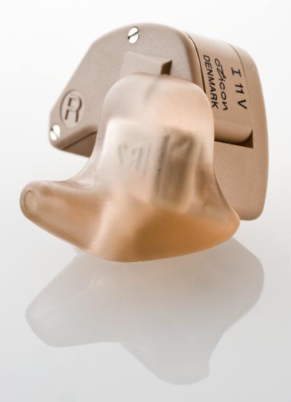 Oticon I II V intra aural hearing aid, by Oticon, Denmark, 1981