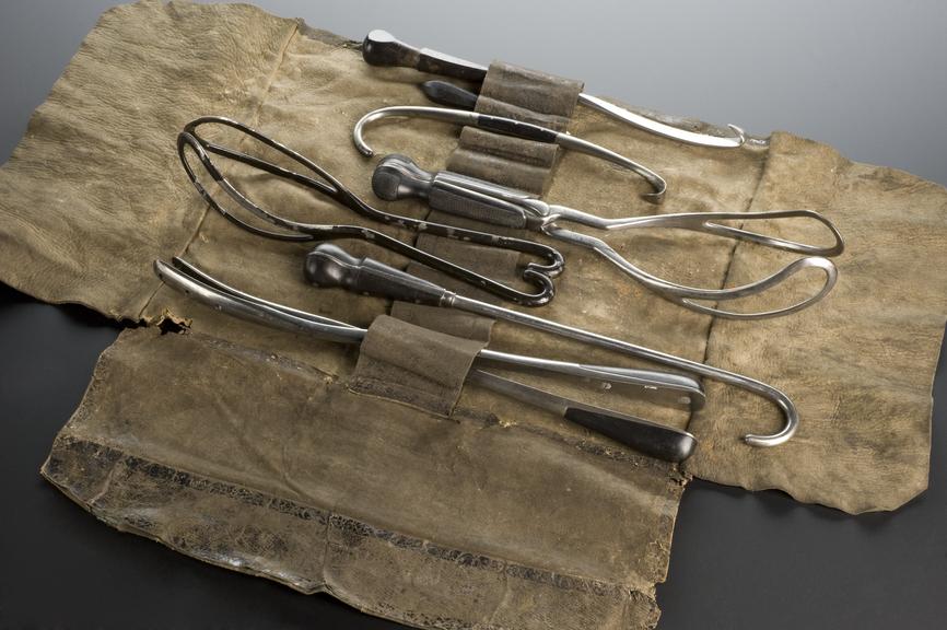 Obstetrical instrument set  in leather bag comprising 3 sets of