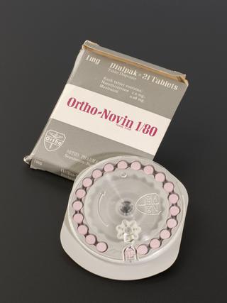 Contraceptive pills with dispenser, England, 1960-1970